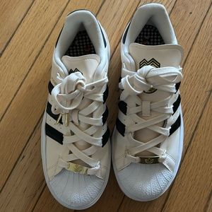 Only worn once adidas sneakers. Super cute can dress them up or down!